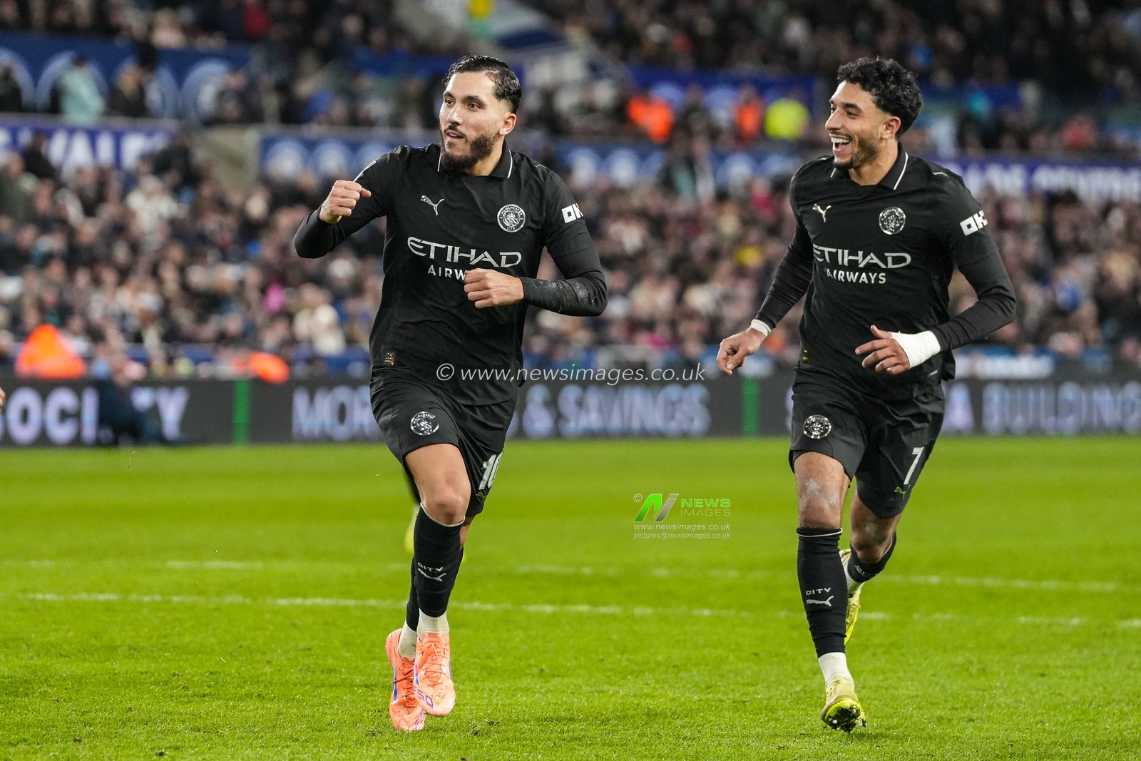 Rayan Cherki of Manchester City celebrates scoring his teams third goal with Omar Marmoush during the Carabao Cup Last 16 Swansea City vs Manchester City at Swansea.com Stadium, Swansea, United Kingdom, 29th October 2025

(Photo by Andrew Lewis/News Images)

*** GER AUT SUI OUT ***