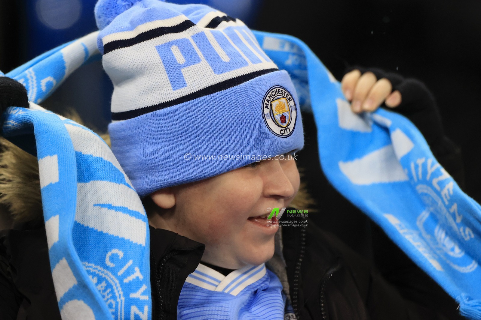 Young City fan ahead of the Premier League match Manchester City vs Tottenham Hotspur at Etihad Stadium, Manchester, United Kingdom, 3rd December 2023

(Photo by Conor Molloy/News Images)