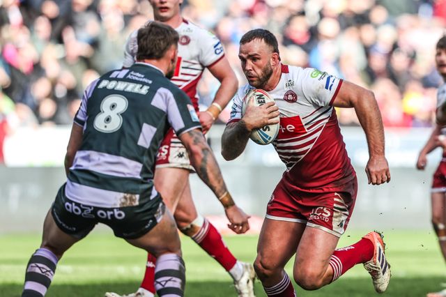 Kaide Ellis of Wigan Warriors breaks with the ball during the Betfred Super League round 6 match Wigan Warriors vs Huddersfield Giants at The Brick Community Stadium, Wigan, United Kingdom on 28 March 2026

(Photo by Alfie Cosgrove/News Images)