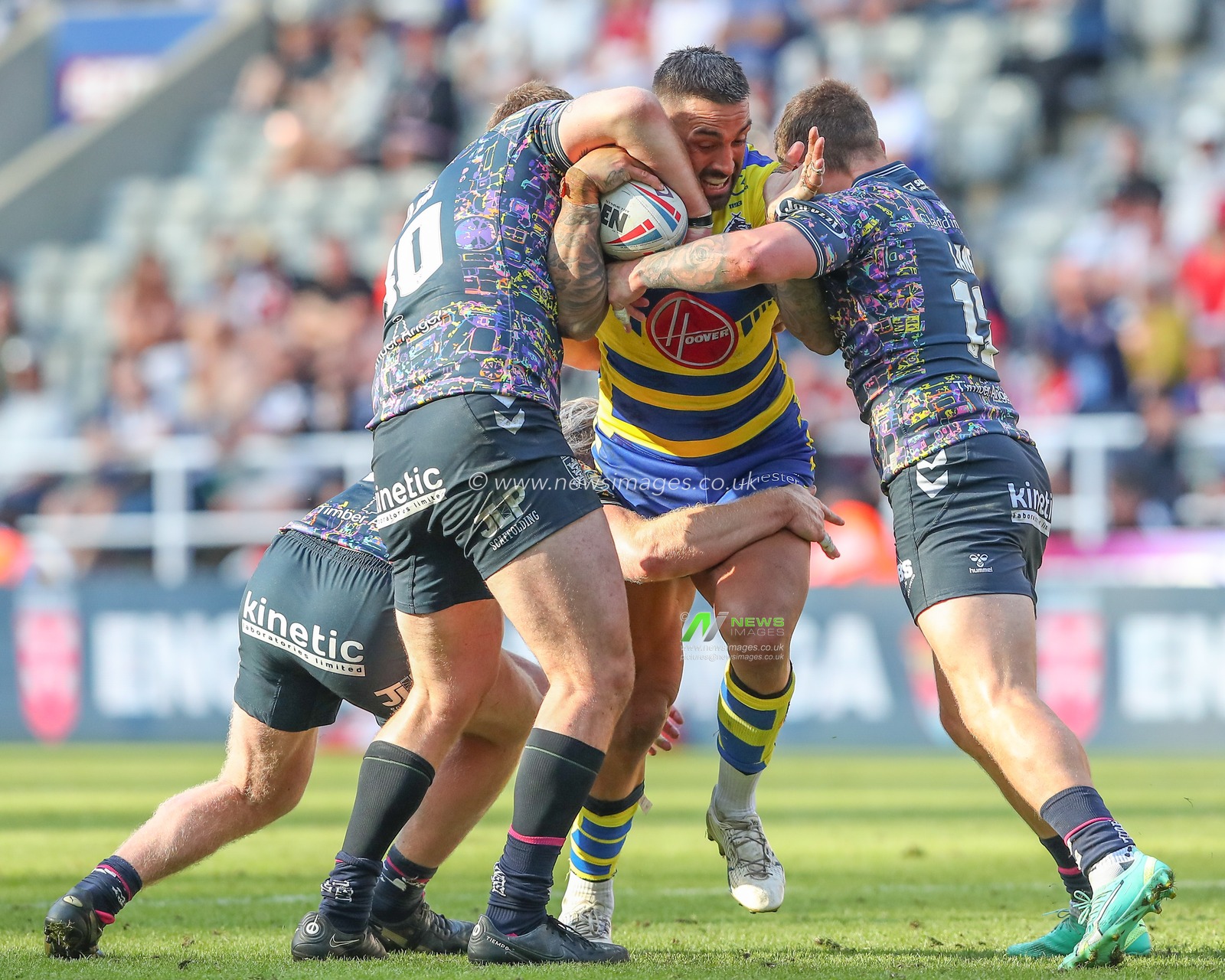 Paul Vaughan #10 of Warrington Wolves is tackled during the Magic Weekend match Hull FC vs Warrington Wolves at St. James's Park, Newcastle, United Kingdom, 4th June 2023

(Photo by Gareth Evans/News Images)