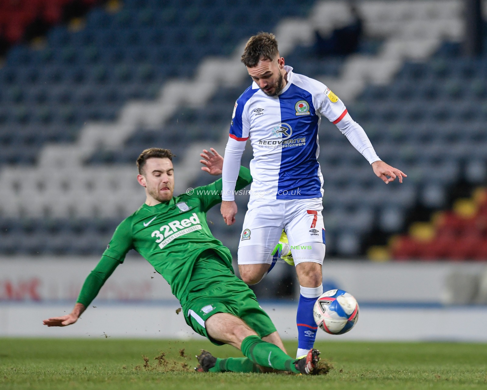 Ben Whiteman #17 of Preston North End makes a vital tackle to stop Adam Armstrong #7 of Blackburn Rovers going through on goal