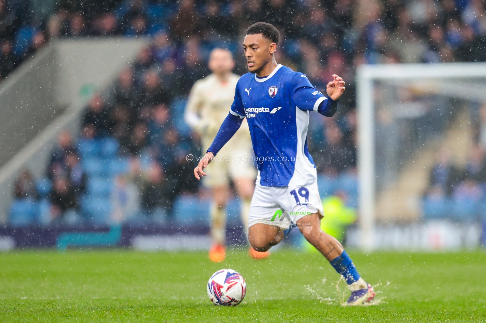 Lewis Gordon of Chesterfield goes forward with the ball during the Sky Bet League 2 match Chesterfield vs Harrogate Town at SMH Group Stadiumact Stadium, Chesterfield, United Kingdom, 22nd March 2025

(Photo by Richard Bierton/News Images)