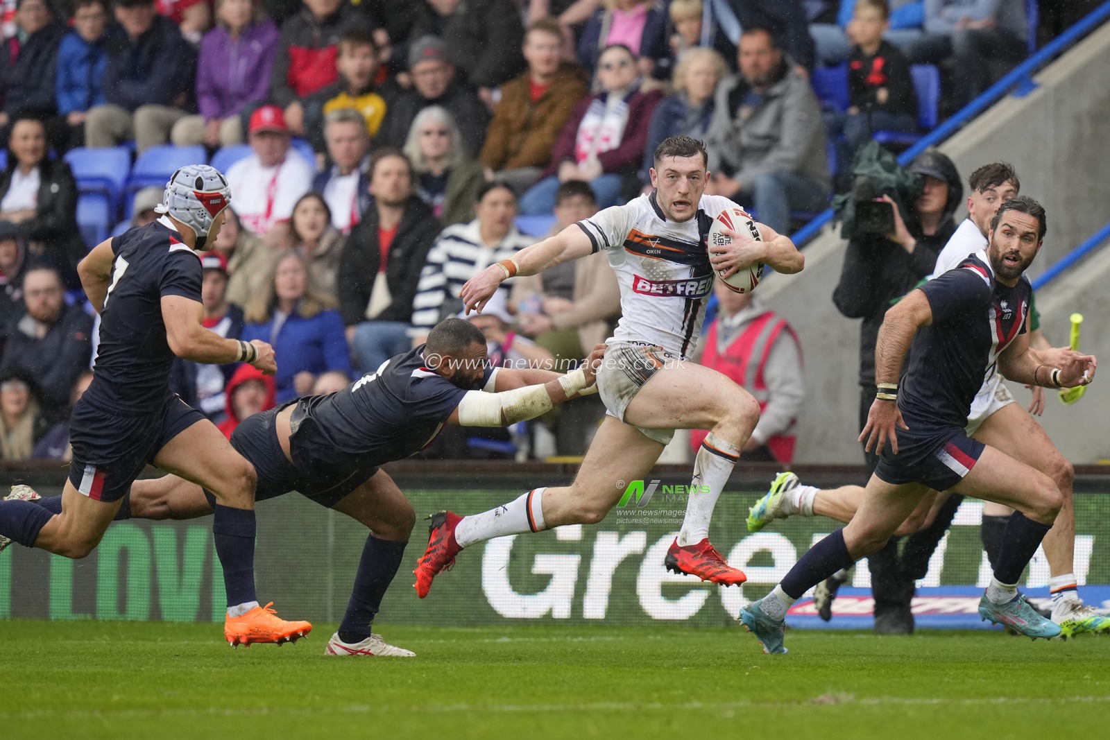 Jake Wardle #4 of England makes a break past Samisoni Langi #3 of France during the Mid Season International match England vs France at Halliwell Jones Stadium, Warrington, United Kingdom, 29th April 2023

(Photo by Steve Flynn/News Images)