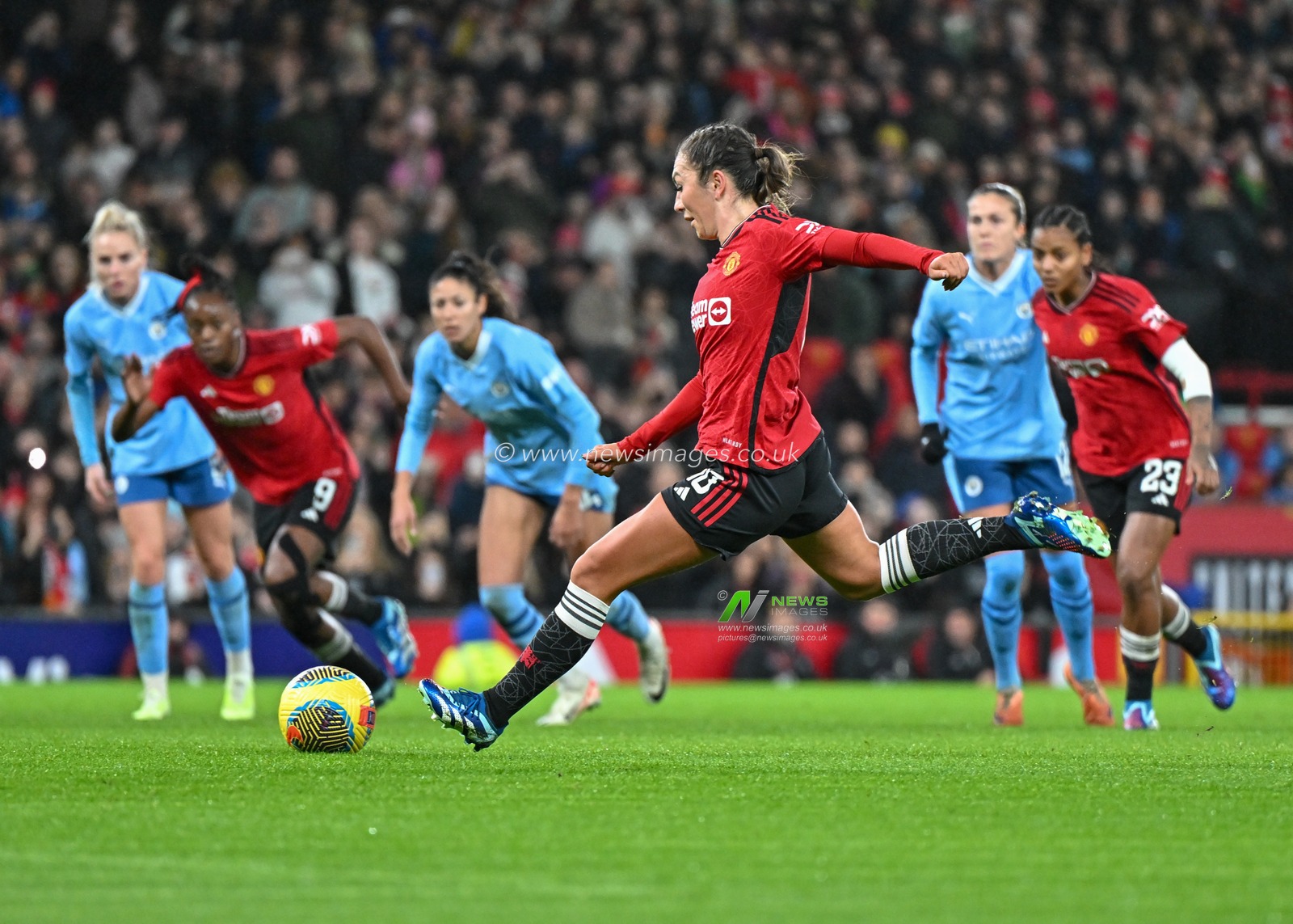 Katie Zelem #10 of Manchester United Women strikes the opening goal of the match, during the The FA Women's Super League match Manchester United Women vs Manchester City Women at Old Trafford, Manchester, United Kingdom, 19th November 2023

(Photo by Cody Froggatt/News Images)