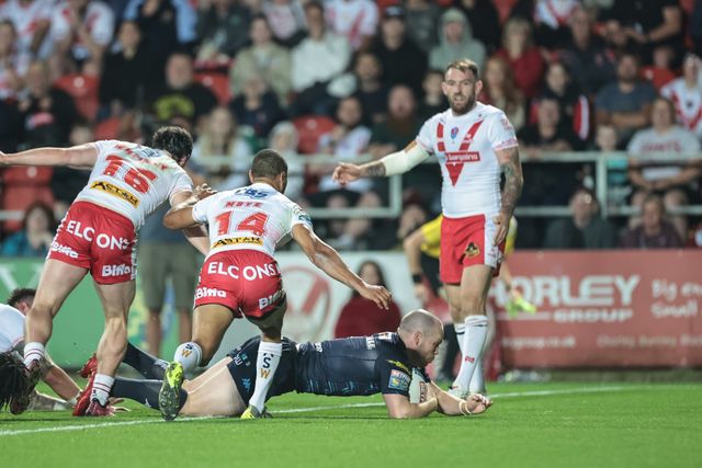 Liam Marshall of Wigan Warriors goes over for a try during the Betfred Super League Round 25 match St Helens vs Wigan Warriors at Totally Wicked Stadium, St Helens, United Kingdom, 5th September 2025

(Photo by Mark Cosgrove/News Images)