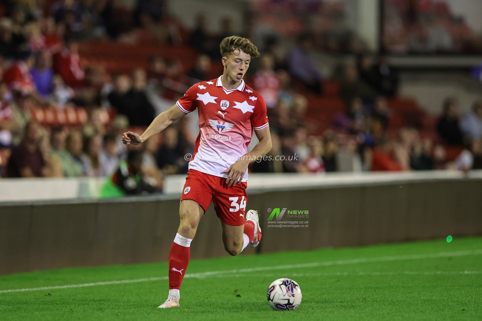 Daniel Benson #34 of Barnsley breaks with the ball during the EFL Trophy match Barnsley vs Grimsby Town at Oakwell, Barnsley, United Kingdom, 5th September 2023

(Photo by Mark Cosgrove/News Images)