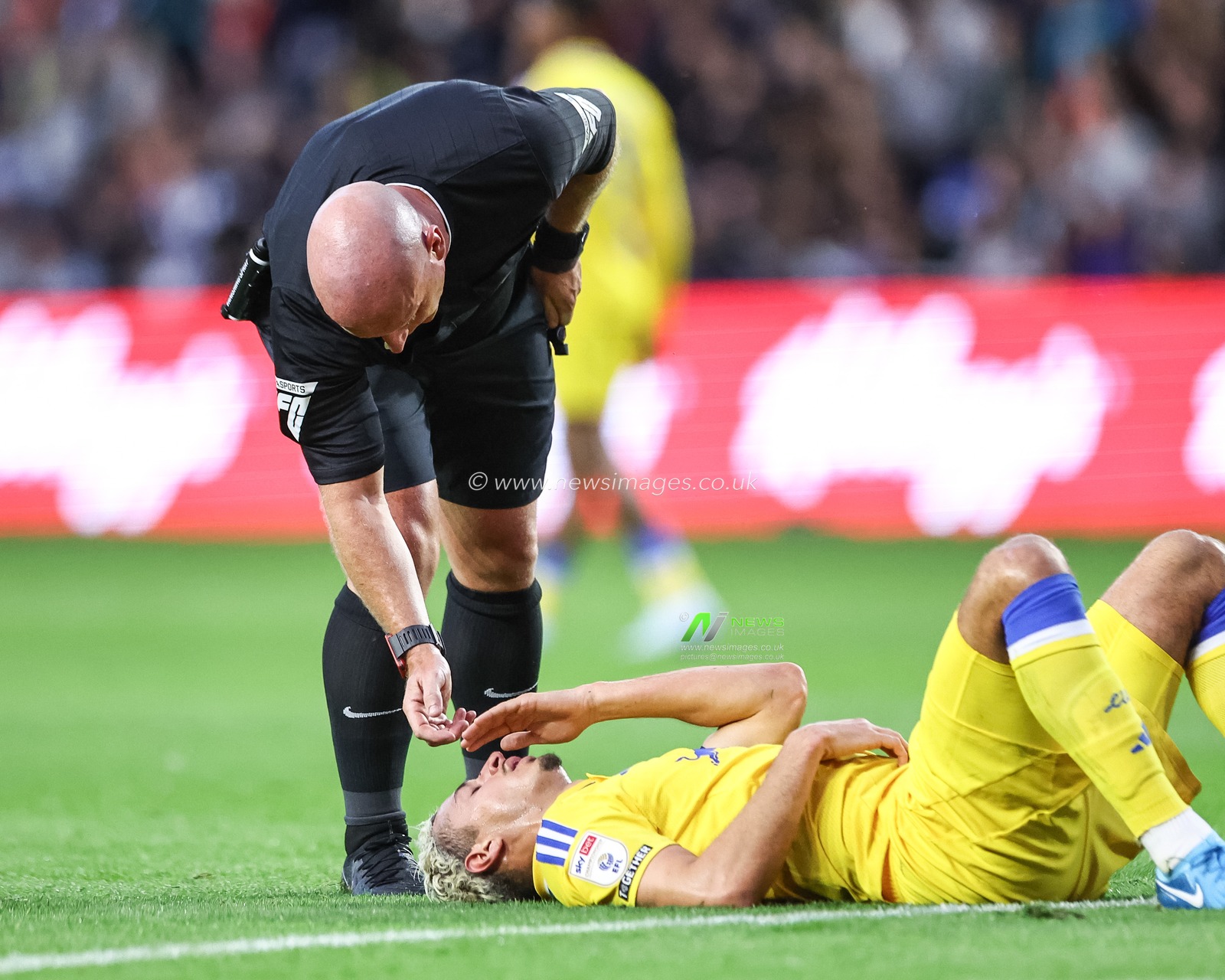 Referee Simon Hooper   checks on Ethan Ampadu of Leeds United during the Sky Bet Championship match Sheffield Wednesday vs Leeds United at Hillsborough, Sheffield, United Kingdom, 23rd August 2024

(Photo by Mark Cosgrove/News Images)
