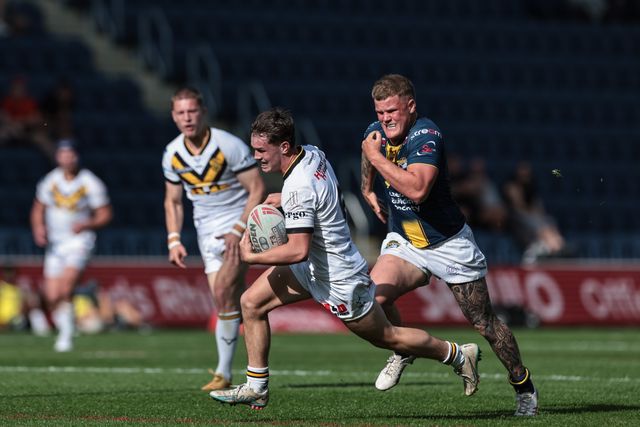 Jenson Windley of Castleford Tigers Reserves runs in a solo try during the Rugby League Reserves match Leeds Rhinos Reserves vs Castleford Tigers Reserves at AMT Headingley Stadium, Leeds, United Kingdom on 22 May 2026

(Photo by Mark Cosgrove/News Images)