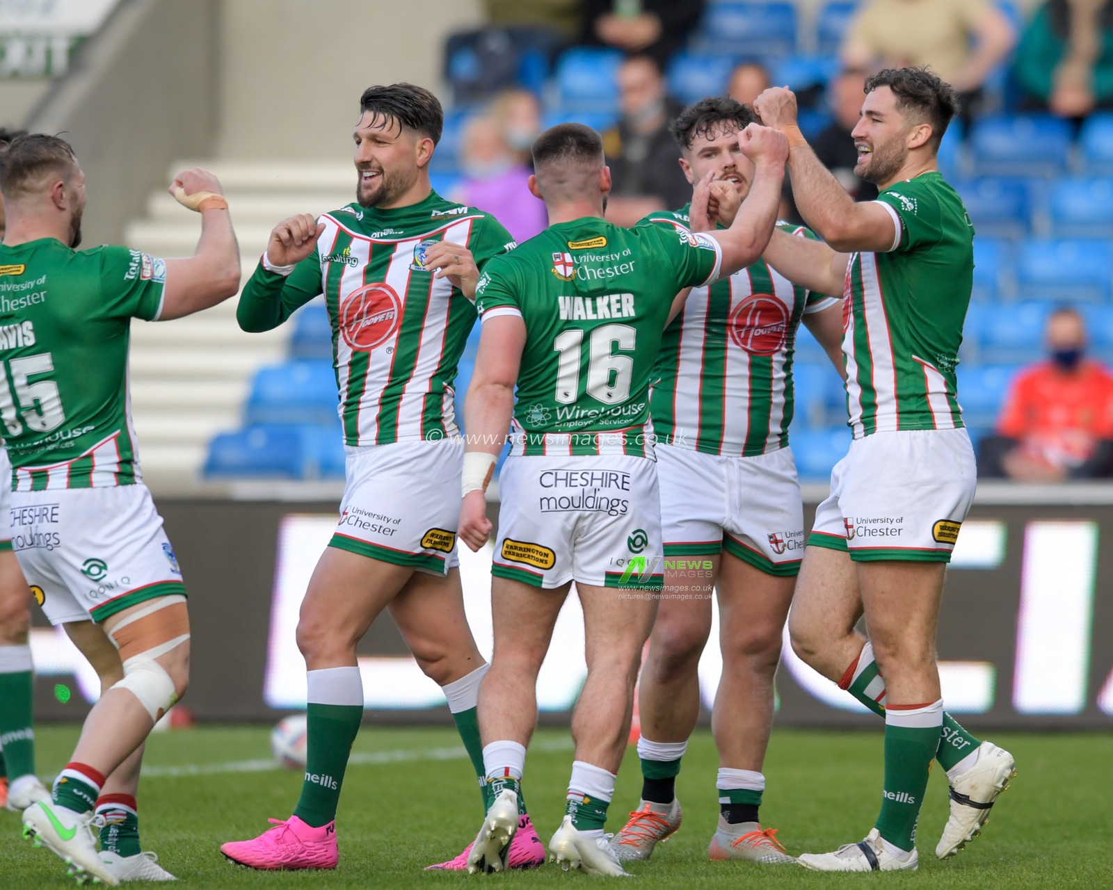 Toby King (4) of Warrington Wolves celebrates scoring a try with his team mates to make it 0-16