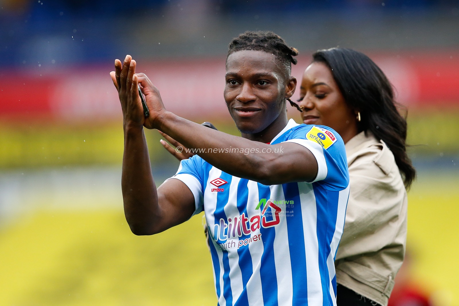 Joseph Hungbo #16 of Huddersfield Townapplauds fans after the Sky Bet Championship match Huddersfield Town vs Reading at John Smith's Stadium, Huddersfield, United Kingdom, 8th May 2023

(Photo by Ben Early/News Images)