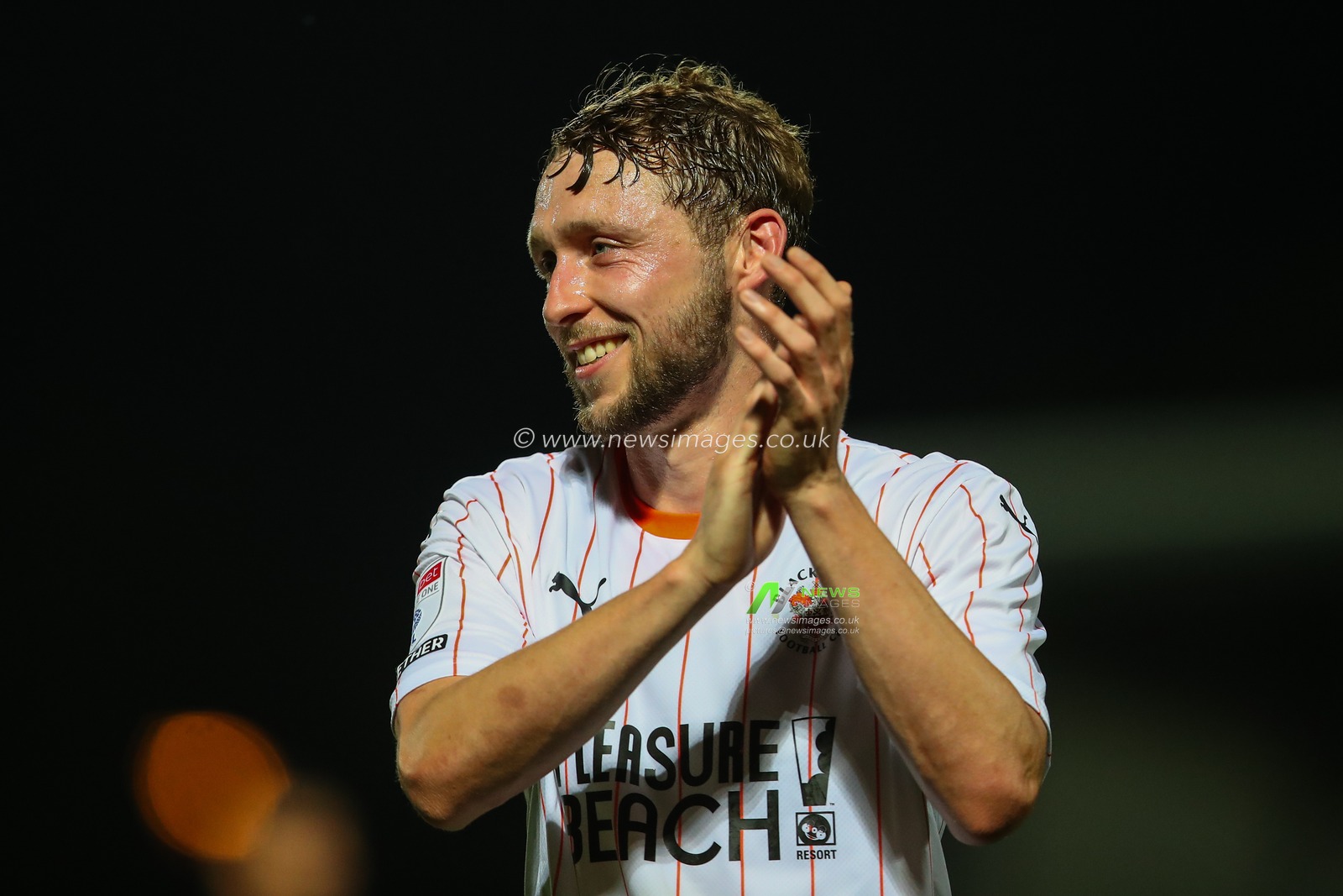 Matthew Pennington of Blackpool applauds the travelling fans after the Carabao Cup match Burton Albion vs Blackpool at Pirelli Stadium, Burton upon Trent, United Kingdom, 13th August 2024

(Photo by Gareth Evans/News Images)