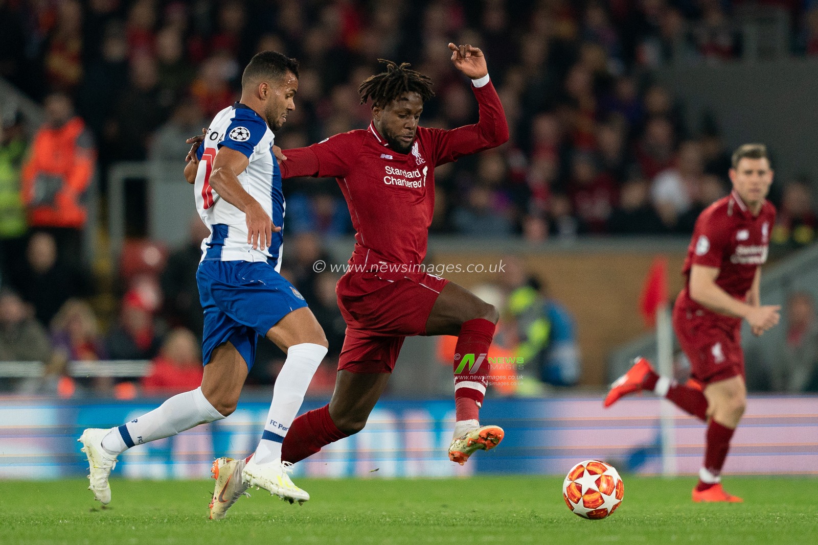 Liverpool's Divock Origi battles with Portoâ€™s Fernando

9th April 2019 , Anfield Stadium, Liverpool, England;  EUFA Champions League Quarter Final, First Leg, Liverpool FC vs FC Porto 

Credit: Terry Donnelly/News Images