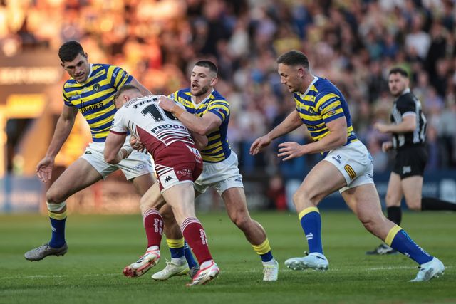Luke Thompson of Wigan Warriors is tackled by Danny Walker of Warrington Wolves during the Betfred Super League round 9 match Warrington Wolves vs Wigan Warriors at The Halliwell Jones Stadium, Warrington, United Kingdom on 24 April 2026

(Photo by Mark Cosgrove/News Images)