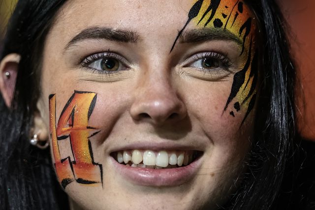 A Castleford Tigers fan with a faceprint smiles in the crowd during the Betfred Super League Round 3 match Castleford Tigers vs Huddersfield Giants at OneBore Stadium, Castleford, Untied Kingdom on 27 February 2026

(Photo by Mark Cosgrove/News Images)