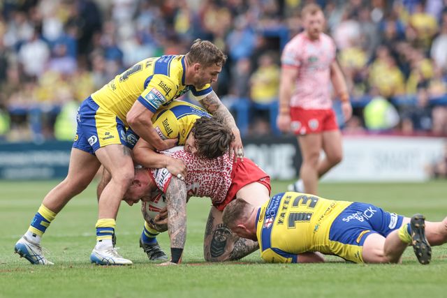 Josh Charley of Leigh Leopards is tackled by Max Wood of Warrington Wolves Luke Yates of Warrington Wolves and Sam Powell of Warrington Wolves during the Betfred Super League Round 25 match Warrington Wolves vs Leigh Leopards at Halliwell Jones Stadium, Warrington, United Kingdom, 6th September 2025

(Photo by Mark Cosgrove/News Images)
