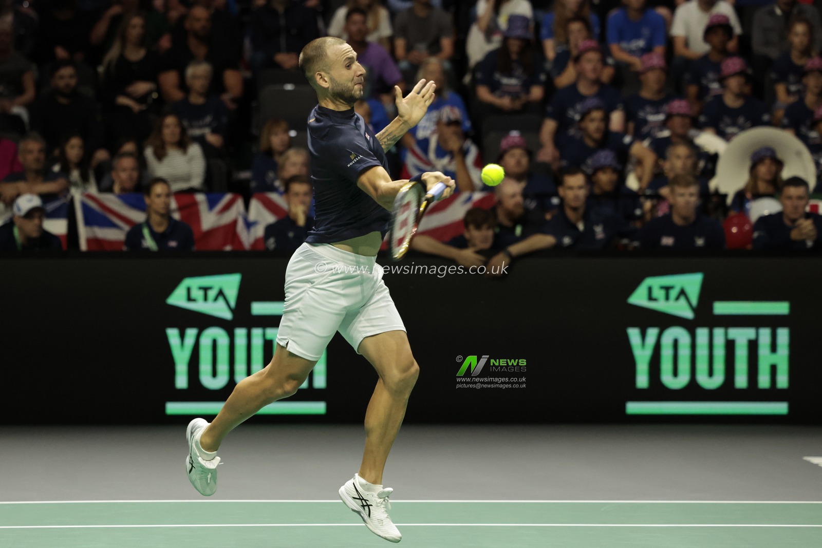 Daniel Evans (GBR) in action against Arthur Fils (FRA) during the Davis Cup match Great Britain vs France at Manchester AO Arena, Manchester, United Kingdom, 17th September 2023

(Photo by Conor Molloy/News Images)