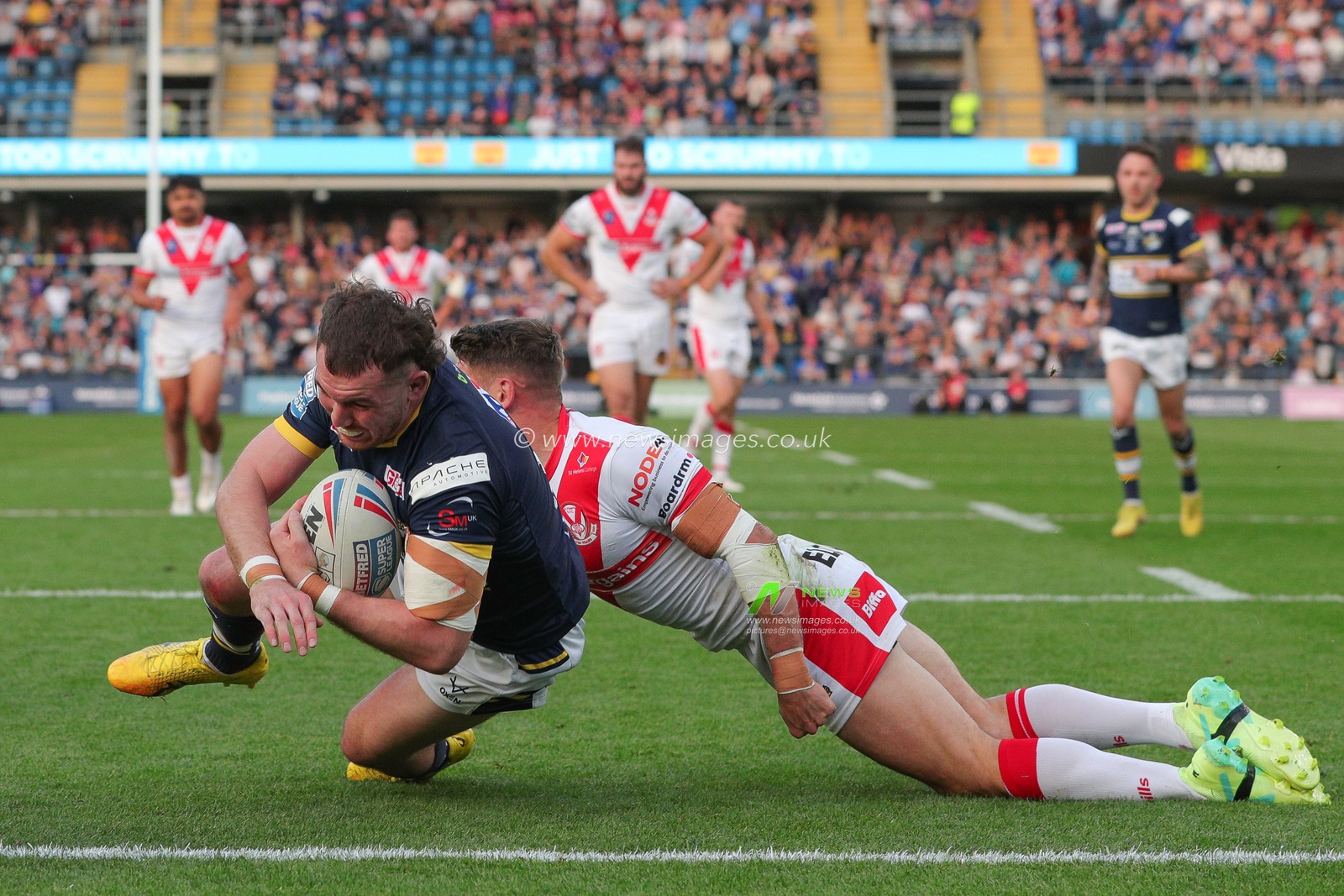 Cameron Smith #13 of Leeds Rhinos goes over for a try and makes the score 10-4 in the first half of the Betfred Super League Round 13 match Leeds Rhinos vs St Helens at Headingley Stadium, Leeds, United Kingdom, 26th May 2023

(Photo by James Heaton/News Images)
