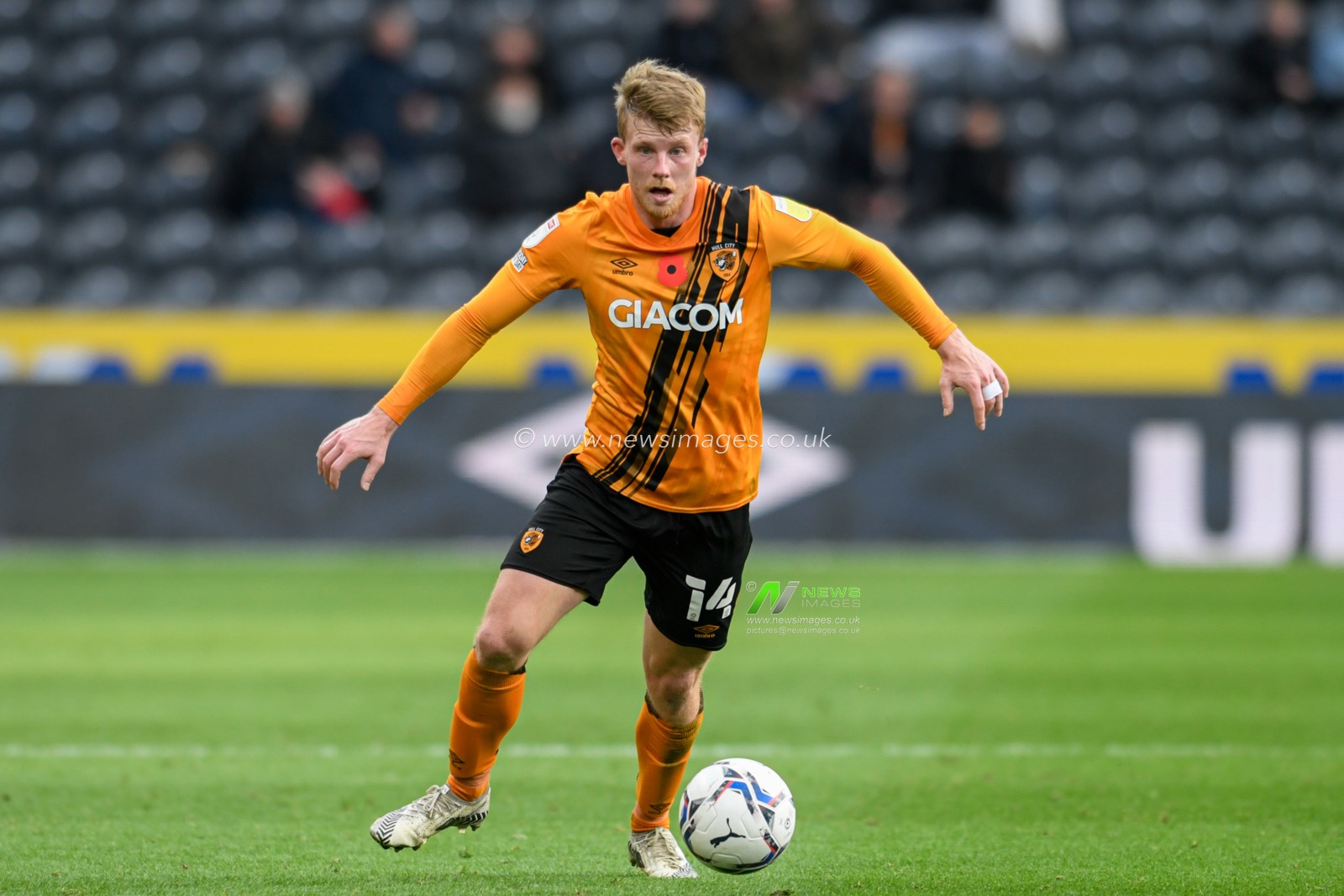 Andy Cannon #14 of Hull City with the ball