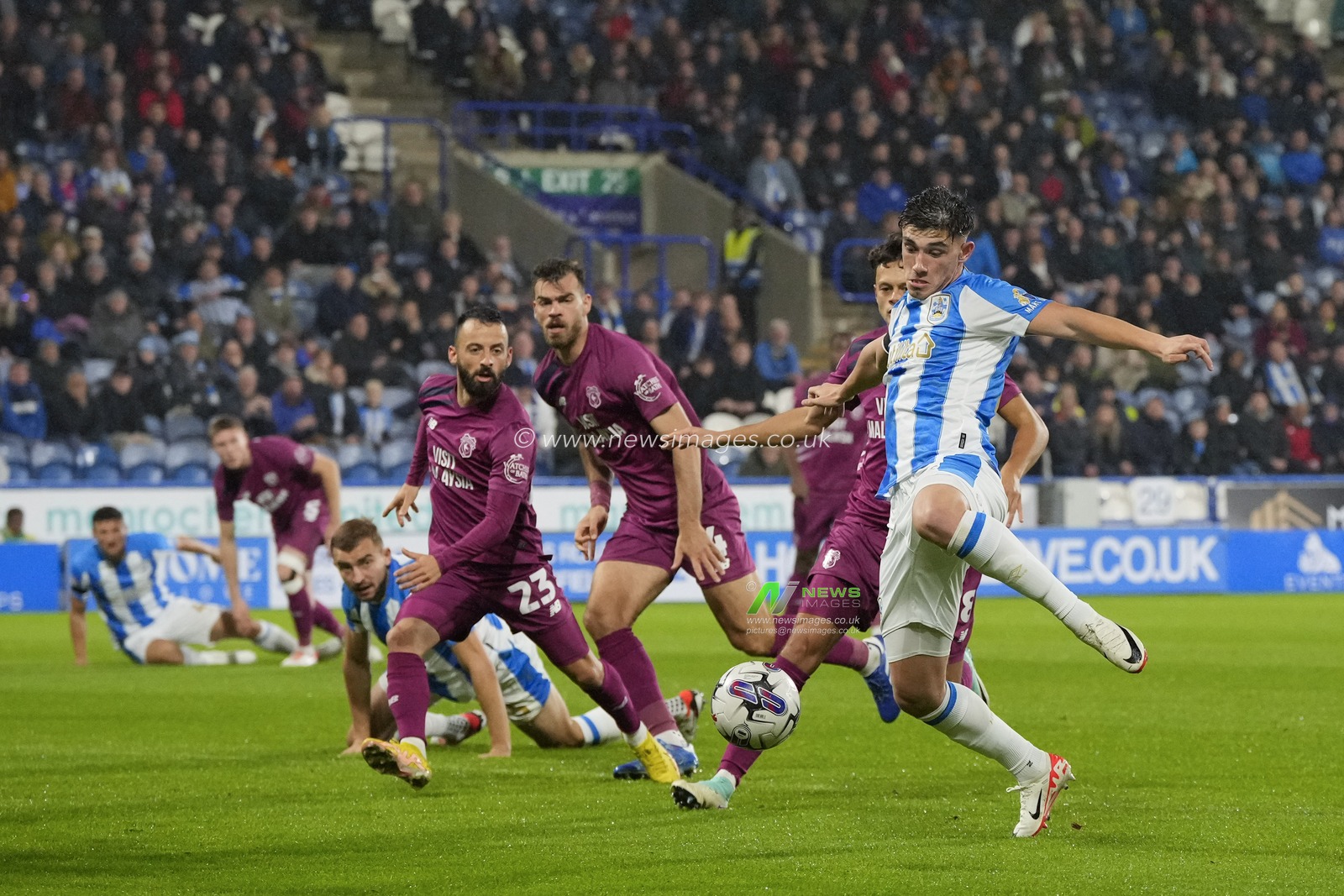 Kian Harratt #22 of Huddersfield Town sets to shoot at goal during the Sky Bet Championship match Huddersfield Town vs Cardiff City at John Smith's Stadium, Huddersfield, United Kingdom, 24th October 2023

(Photo by Steve Flynn/News Images)