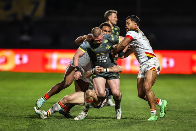 Tom Holroyd of Leeds Rhinos is tackled by Chris Atkin of Bradford Bulls and Esan Marsters of Bradford Bulls during the Betfred Super League round 7 match Bradford Bulls vs Leeds Rhinos at Odsal Stadium, Bradford, United Kingdom on 03 April 2026

(Photo by Alfie Cosgrove/News Images)