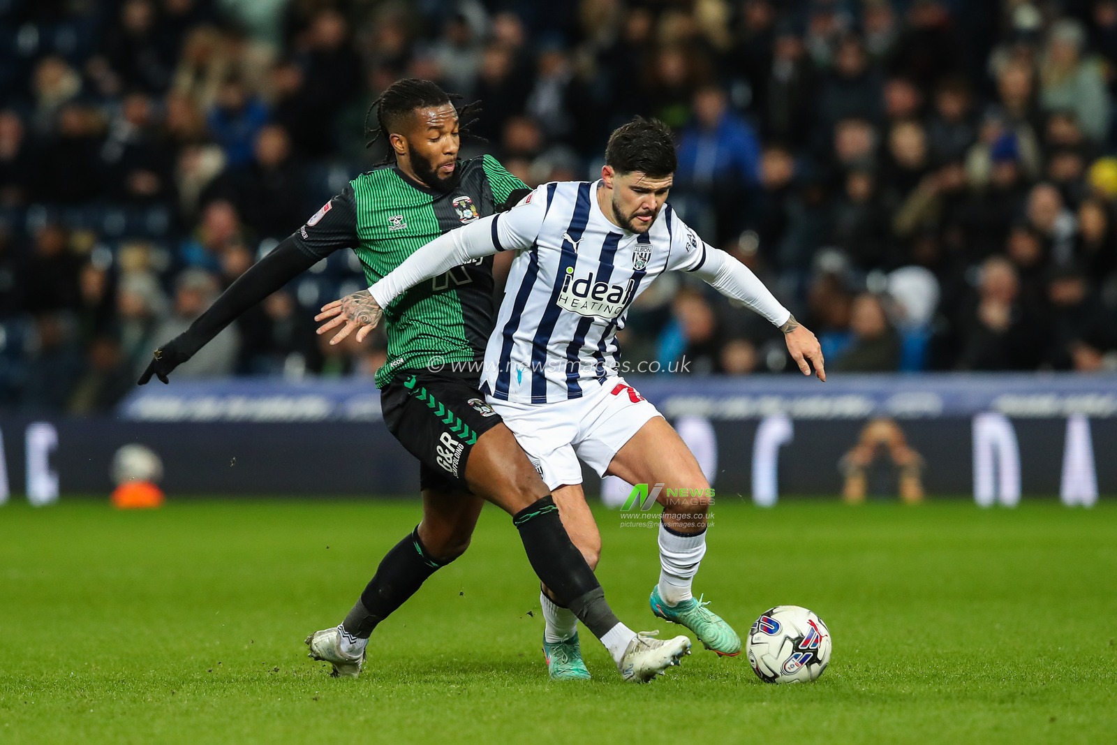 Alex Mowatt of West Bromwich Albion holds off Kasey Palmer of Coventry City during the Sky Bet Championship match West Bromwich Albion vs Coventry City at The Hawthorns, West Bromwich, United Kingdom, 1st March 2024

(Photo by Gareth Evans/News Images)