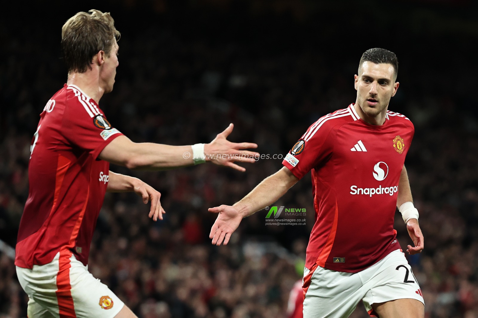 Diogo Dalot of Manchester United celebrates his goal to make it 2-0 during the UEFA Europa League Quarter-finals match Manchester United vs Lyon at Old Trafford, Manchester, United Kingdom, 17th April 2025

(Photo by Mark Cosgrove/News Images)