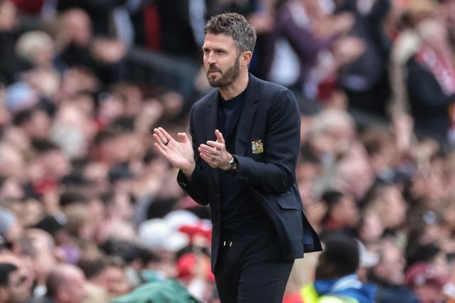 Michael Carrick manager of Manchester United celebrates the goal of Bryan Mbeumo of Manchester United to make it 3-1 during the Premier League match Manchester United vs Nottingham Forest at Old Trafford, Manchester, United Kingdom on 17 May 2026

(Photo by Mark Cosgrove/News Images)