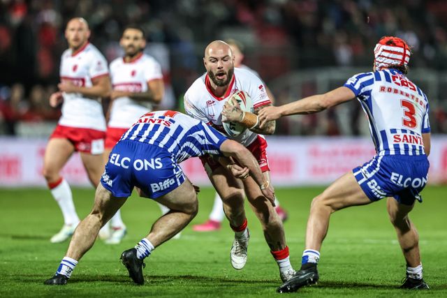 Sam Luckley of Hull KR is tackled by Noah Stephens of St Helens during the Betfred Super League round 6 match Hull KR vs St Helens at Sewell Group Craven Park, Hull, United Kingdom on 27 March 2026

(Photo by Alfie Cosgrove/News Images)