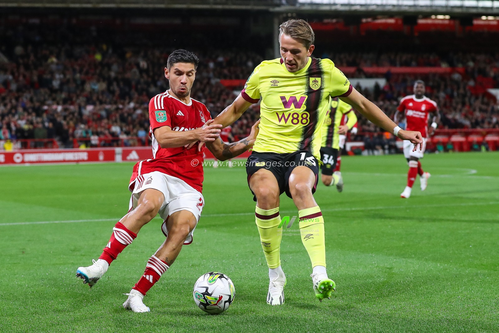 Gonzalo Montiel #29 of Nottingham Forest and Sander Berge #16 of Burnley battle for the ball during the Carabao Cup match Nottingham Forest vs Burnley at City Ground, Nottingham, United Kingdom, 30th August 2023

(Photo by Gareth Evans/News Images)