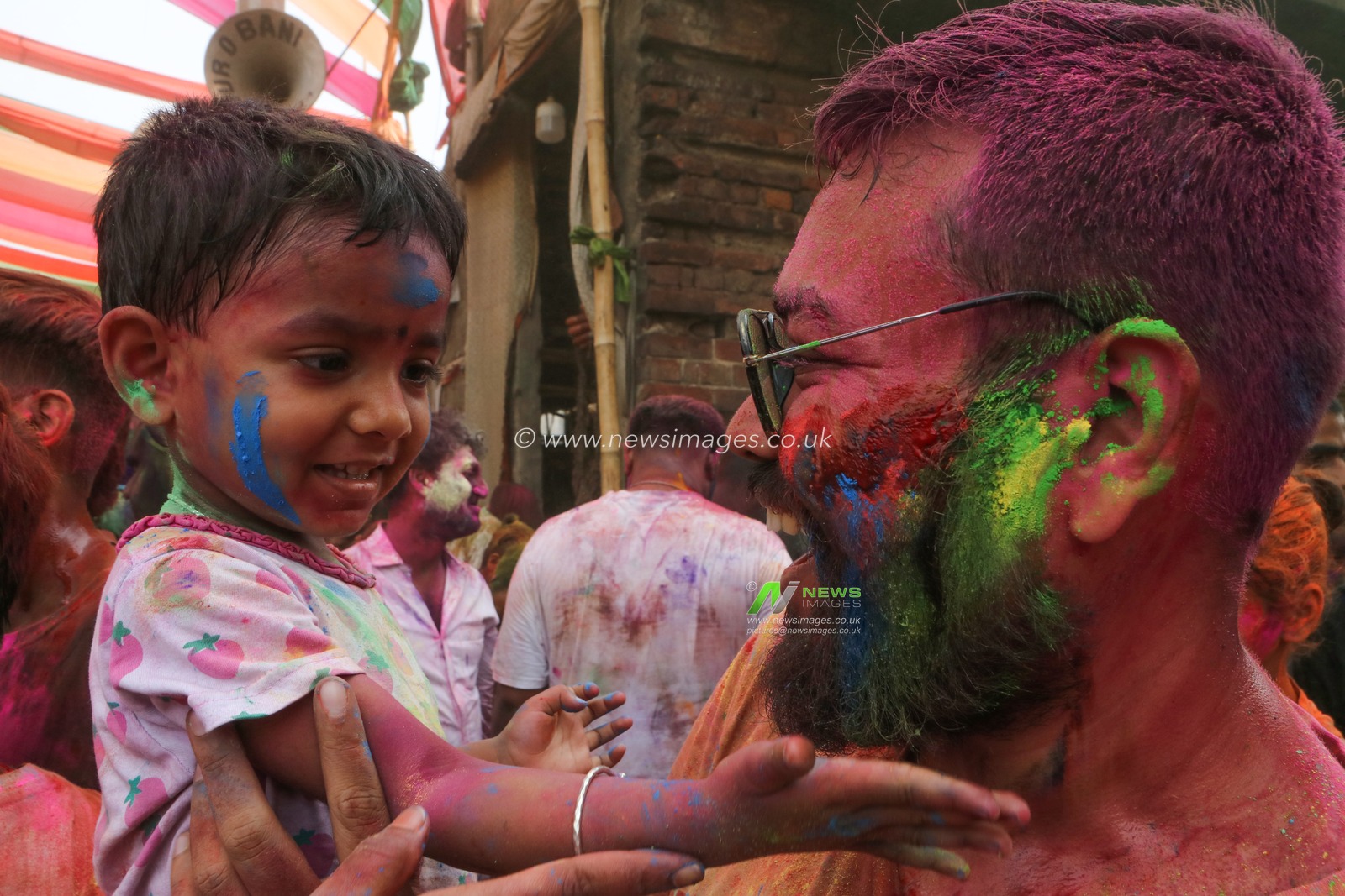 People celebrate the annual Holi festival in Kolkata,India on March 14,2025.Pictures by Debajyoti Chakraborty.The Hindu festival of Holi brings out the wildest, the loudest, and the most colorful celebration imaginable in India or anywhere else. Crowds fill the streets as brightly colored powder and water fill the air. Holi, also called the Festival of Colors, is celebrated with much enthusiasm on the full moon day in the month of Phalgun, which usually corresponds to the month of March. It marks the arrival of spring and the bright colors represent energy, life, and joy. The festival is also associated with the immortal love of Krishna and Radha, so in Mathura, the birth place of Lord Krishna, this day is also celebrated with a special puja, or prayer, the traditional custom of worshipping Lord Krishna, and an even greater exuberance.(Photo: Debajyoti Chakraborty/News Images)