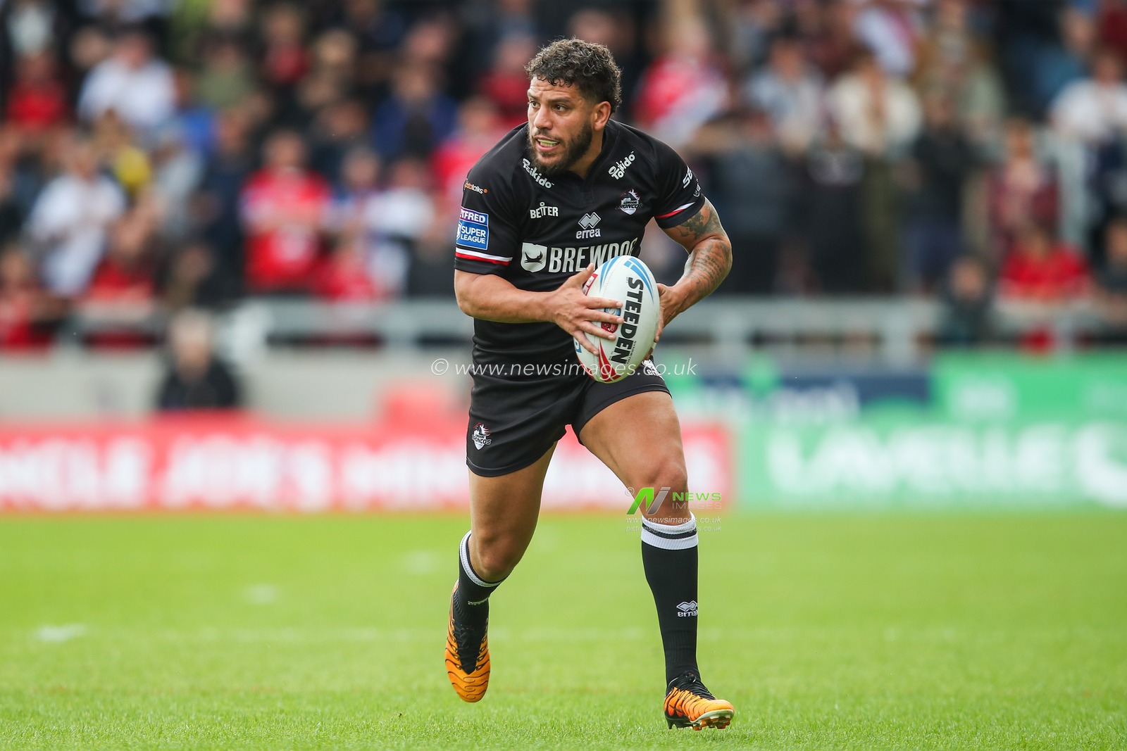 Hakim Miloudi of London Broncos breaks with the ball during the Betfred Super League Round 13 match Salford Red Devils vs London Broncos at Salford Community Stadium, Eccles, United Kingdom, 2nd June 2024

(Photo by Gareth Evans/News Images)