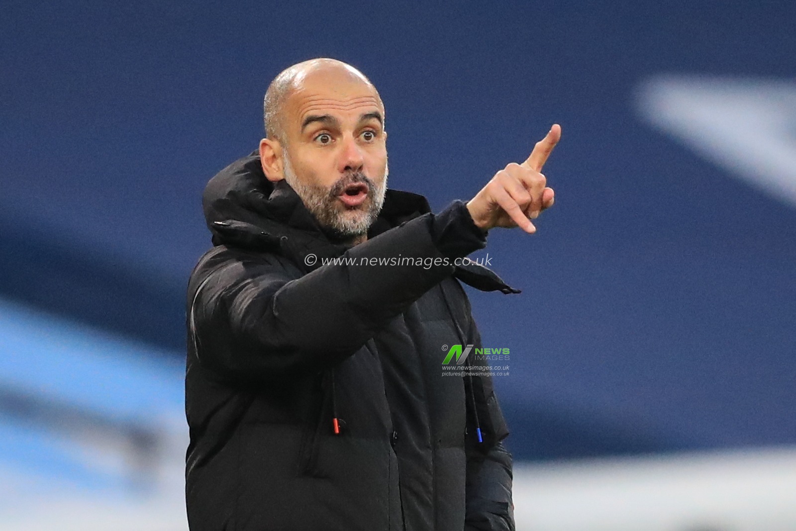 Josep Guardiola manager of Manchester City gives his team instructions