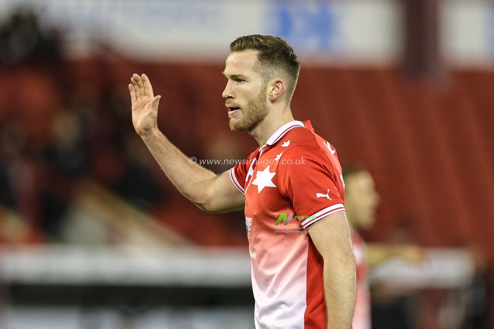 Jamie McCart #26 of Barnsley gives his team instructions  during the Sky Bet League 1 match Barnsley vs Wycombe Wanderers at Oakwell, Barnsley, United Kingdom, 28th November 2023

(Photo by Mark Cosgrove/News Images)