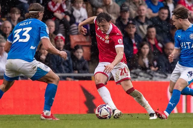 Wrexham's Oliver Rathbone takes on the Stockport County defence during the Sky Bet League 1 match Wrexham vs Stockport County at SToK Cae Ras, Wrexham, United Kingdom, 22nd March 2025

(Photo by Nik Mesney/News Images)