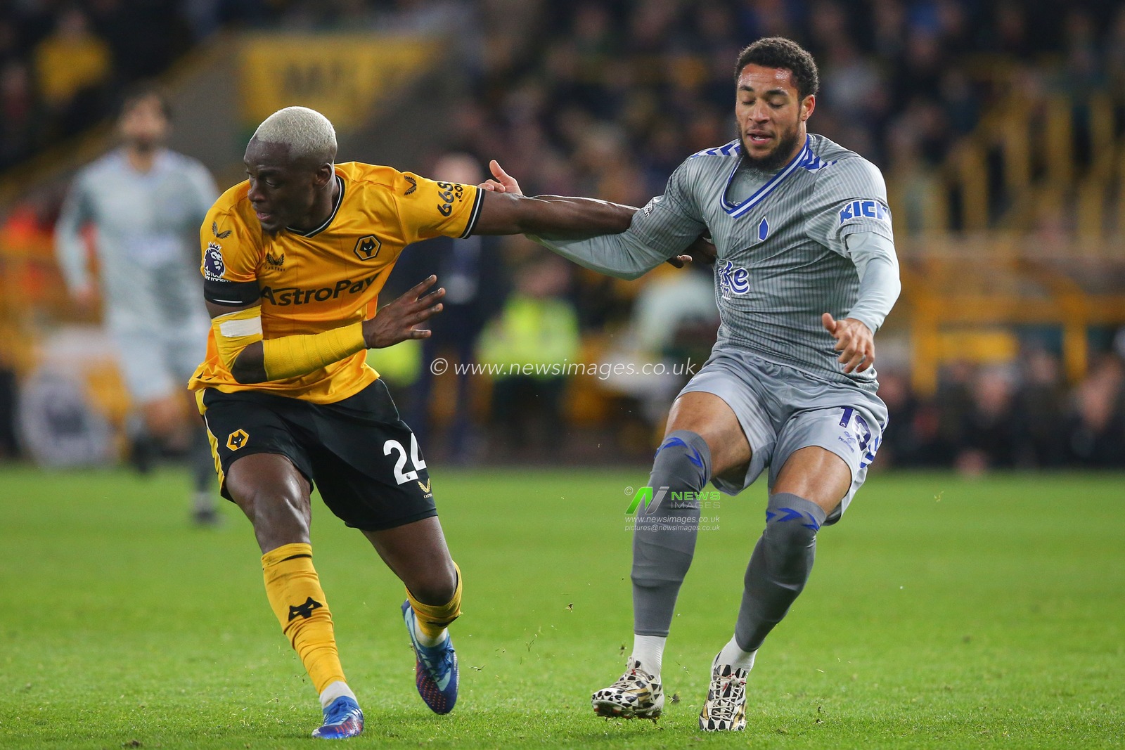 Toti Gomes #24 of Wolverhampton Wanderers and Arnaut Danjuma #10 of Everton battle for the ball during the Premier League match Wolverhampton Wanderers vs Everton at Molineux, Wolverhampton, United Kingdom, 30th December 2023

(Photo by Gareth Evans/News Images)