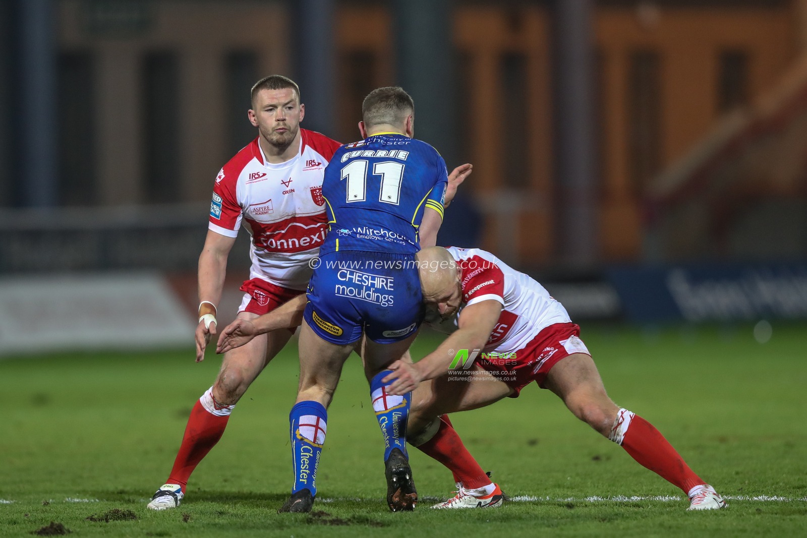 Ben Currie of Warrington Wolves is tackled by Dean Hadley of Hull KR during the Betfred Super League Round 4 match Hull KR vs Warrington Wolves at Sewell Group Craven Park, Kingston upon Hull, United Kingdom, 7th March 2024

(Photo by Alfie Cosgrove/News Images)