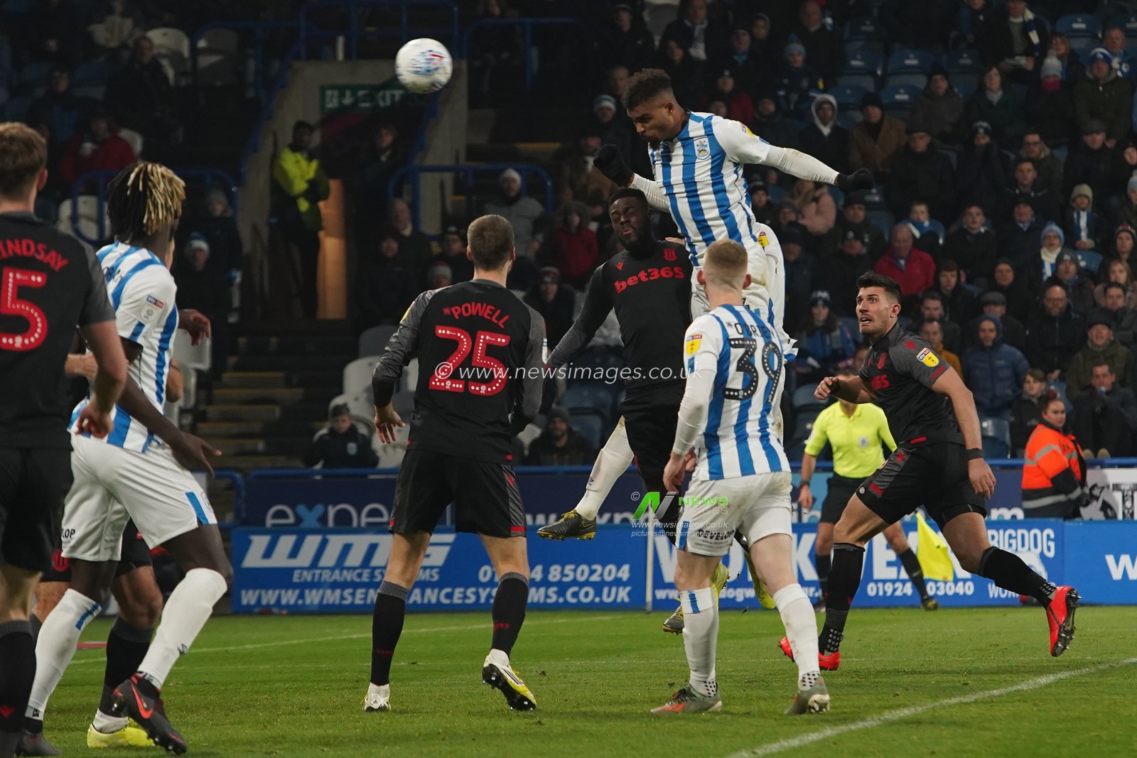 1st January 2020, John Smith's Stadium, Huddersfield, England; Sky Bet Championship, Huddersfield Town v Stoke City : Steve Mounie (24) of Huddersfield Town scores with his head to make it 1-1

Credit: Kurt Fairhurst/News Images