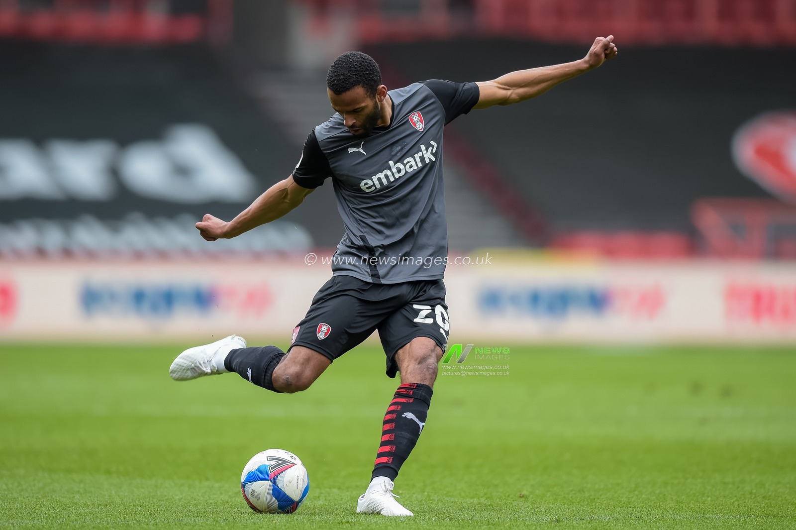 Michael Ihiekwe #20 of Rotherham United with the ball