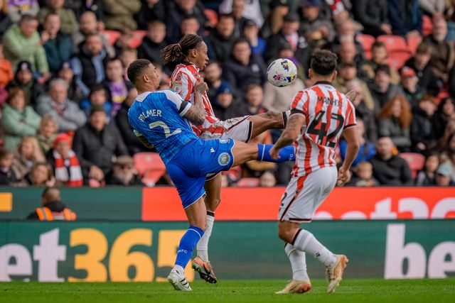 Lamine Cisse of Stoke City challenges for the ball with Liam Palmer of Sheffield Wednesday during the Sky Bet Championship match Stoke City vs Sheffield Wednesday at Bet365 Stadium, Stoke On Trent, United Kingdom on 03 April 2026

(Photo by Maynard Manyowa/News Images)