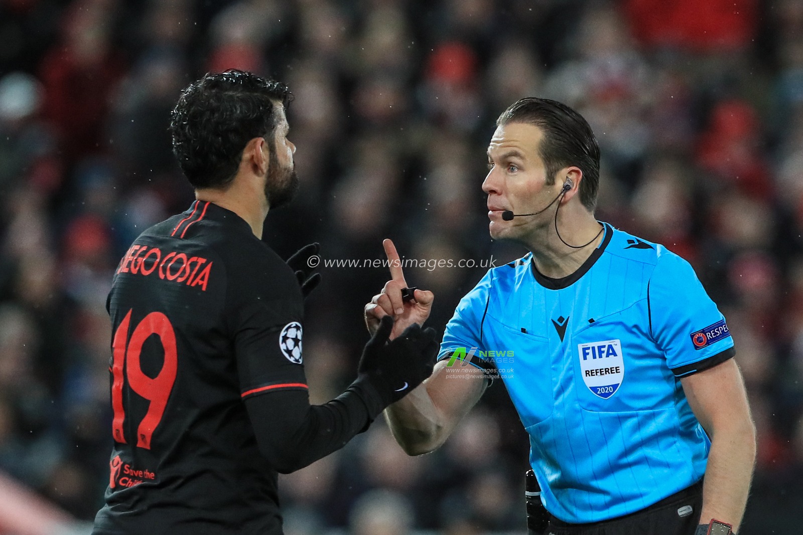 11th March 2020, Anfield, Liverpool, England; UEFA Champions League, Round of 16 Leg 2 of 2, Liverpool v Atletico Madrid : Diego Costa (19) of Atletico Madrid receives a caution from referee Danny Makkelie