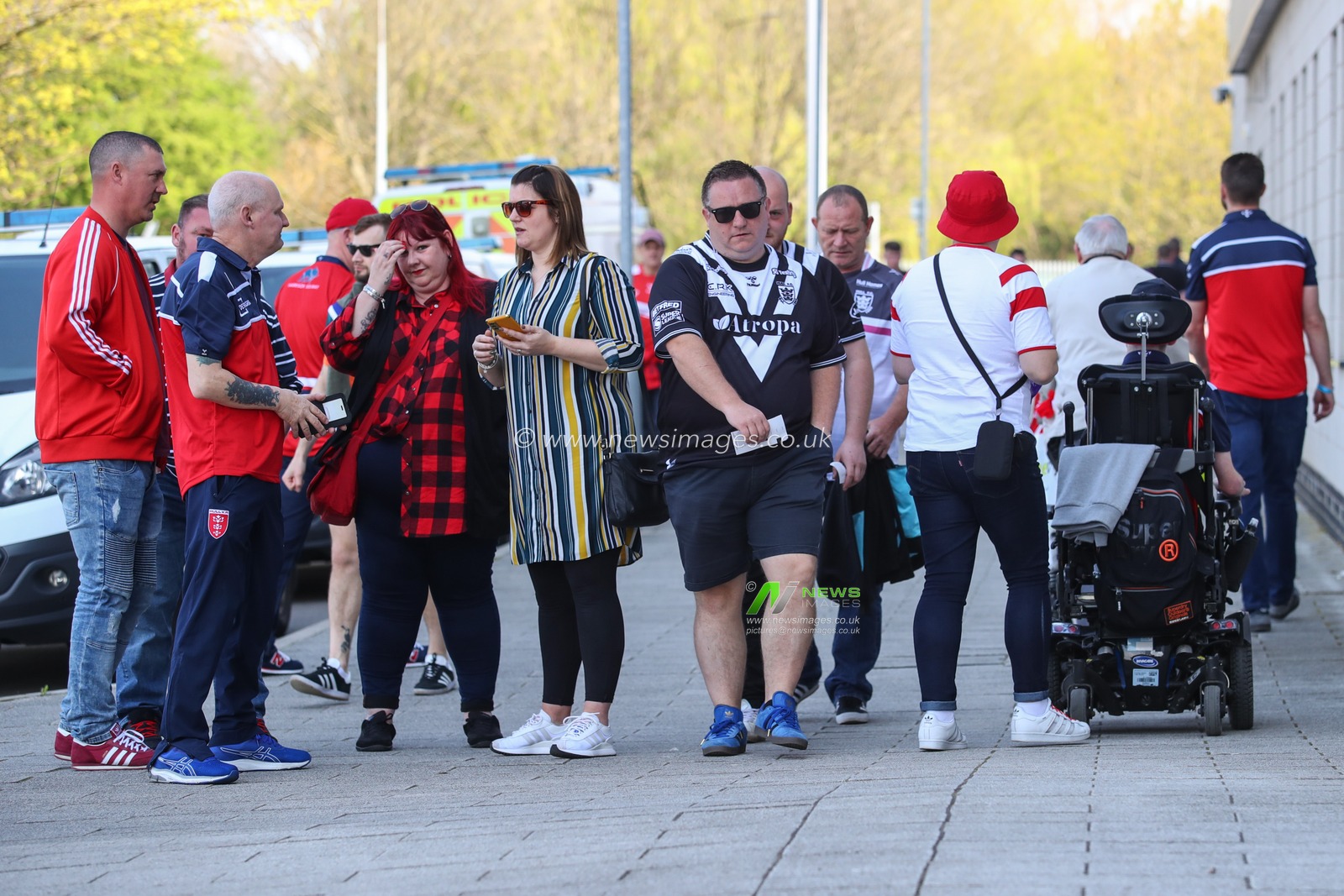 Hull KR fans and Hull FC walk side by side towards Sewell Group Craven Park