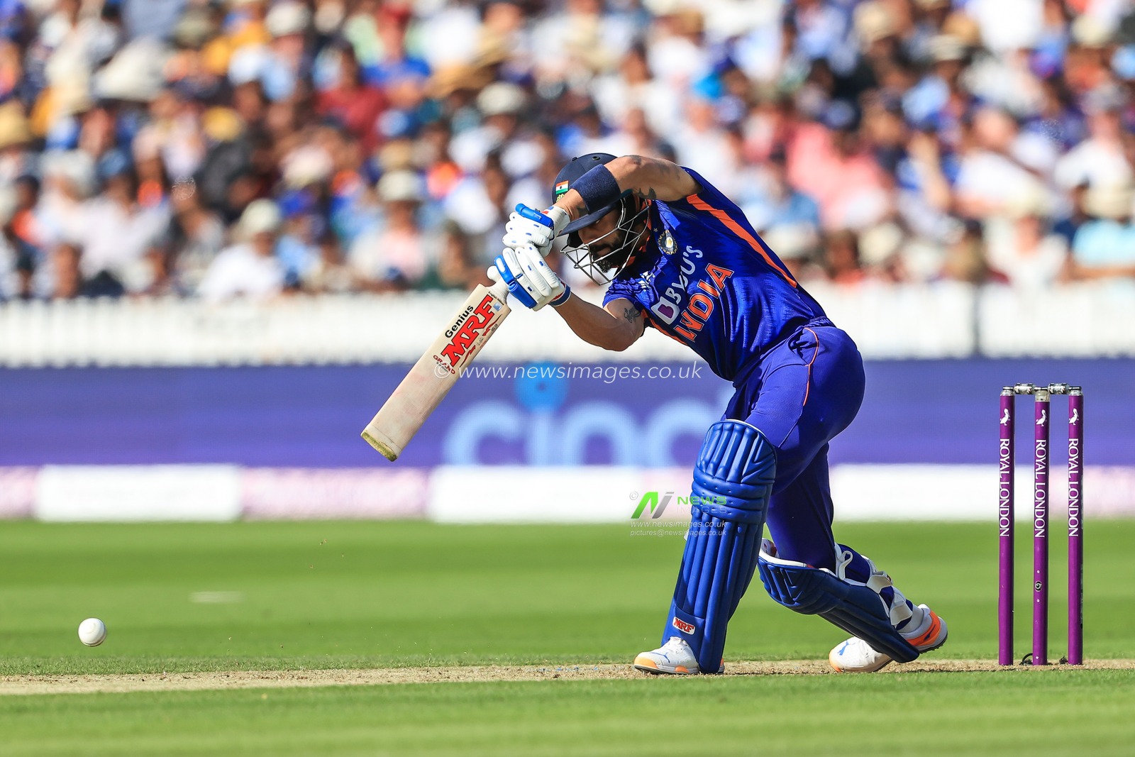 Virat Kohli of India hits a four (4)