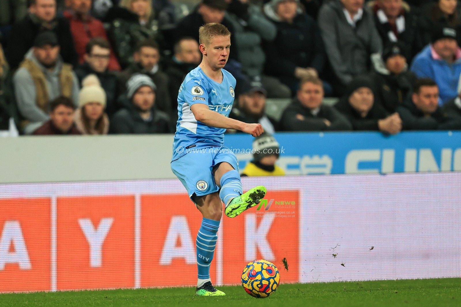 Oleksandr Zinchenko #11 of Manchester City passes the ball