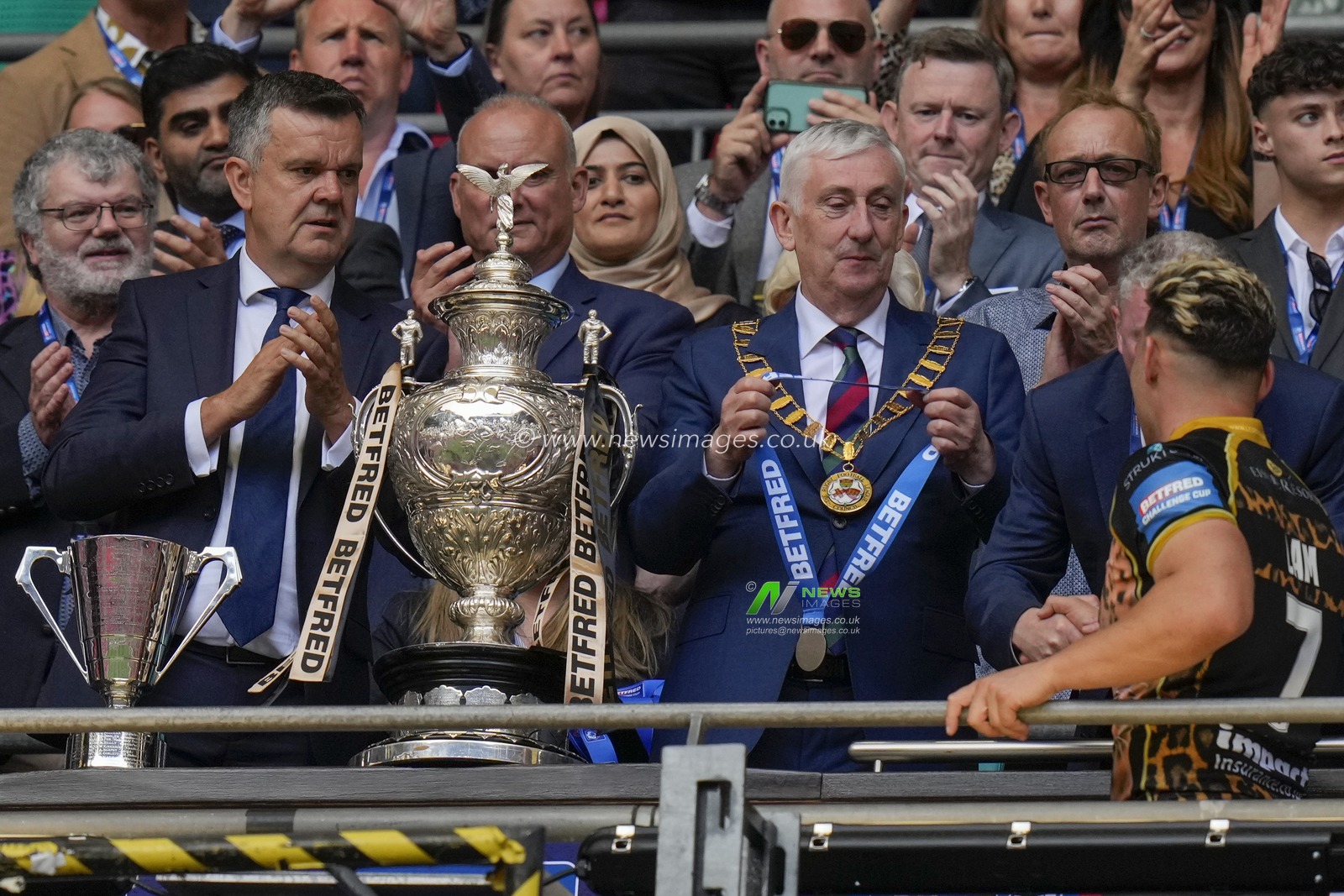 Sir Lindsay Hoyle presents a medal to man of the match Lachlan Lam #7 of Leigh Leopards during the Betfred Challenge Cup match Hull KR vs Leigh Leopards at Wembley Stadium, London, United Kingdom, 12th August 2023

(Photo by Steve Flynn/News Images)
