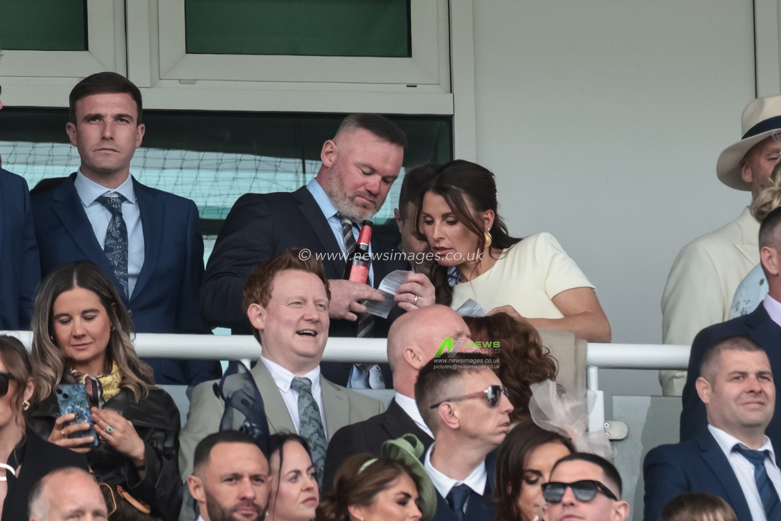Wayne and Coleen Rooney are in the stand for the Grand National during the 2026 Randox Grand National Day at Aintree Racecourse, Aintree, United Kingdom on 11 April 2026

(Photo by Mark Cosgrove/News Images)