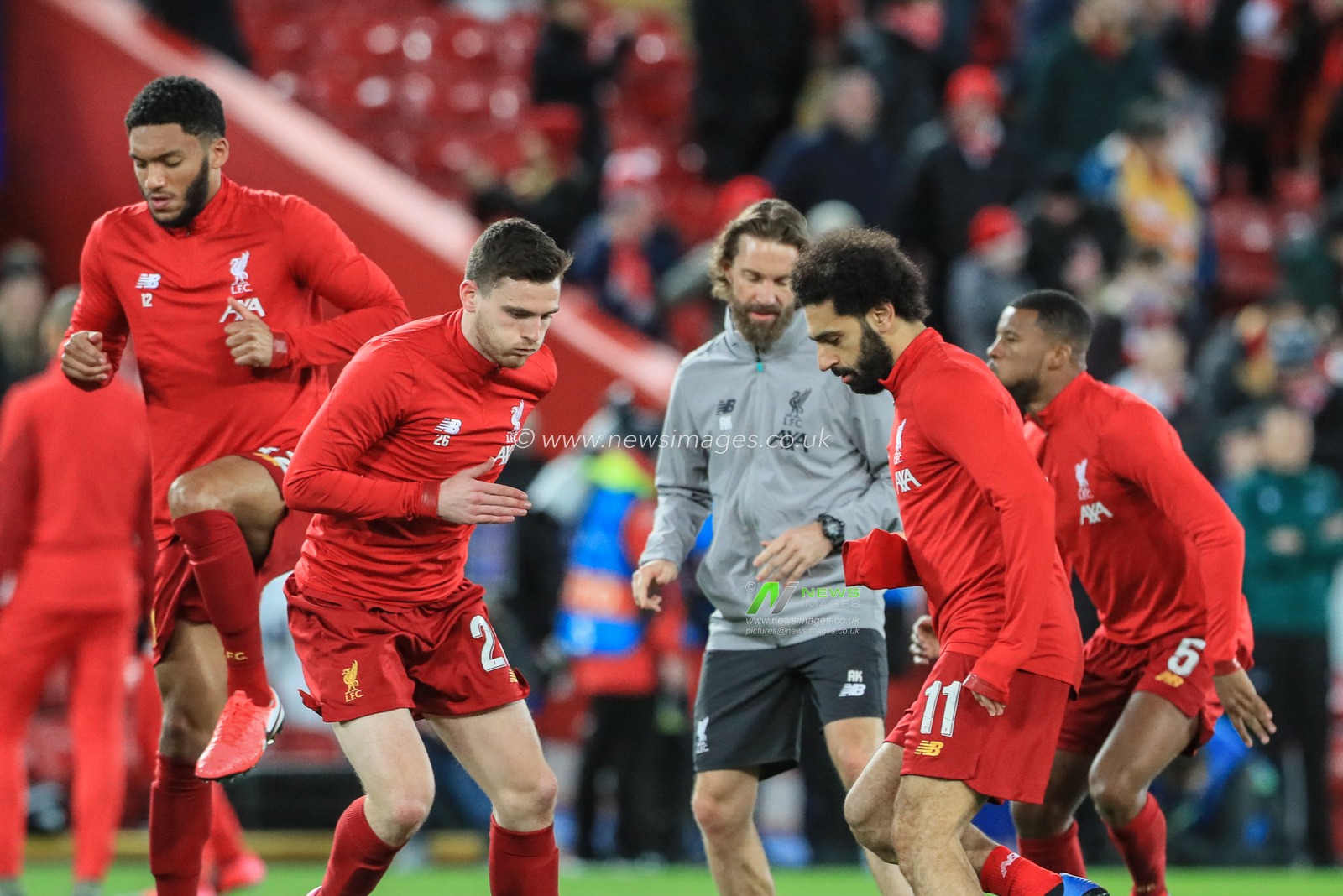 11th March 2020, Anfield, Liverpool, England; UEFA Champions League, Round of 16 Leg 2 of 2, Liverpool v Atletico Madrid : Mohamed Salah (11) of Liverpool and Andrew Robertson (26) of Liverpool during the pre-game warmup
