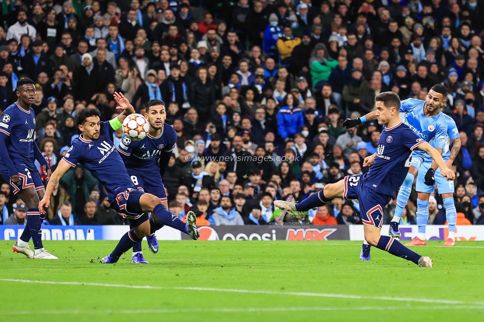 Riyad Mahrez #26 of Manchester City shoots on goal but goes for a corner