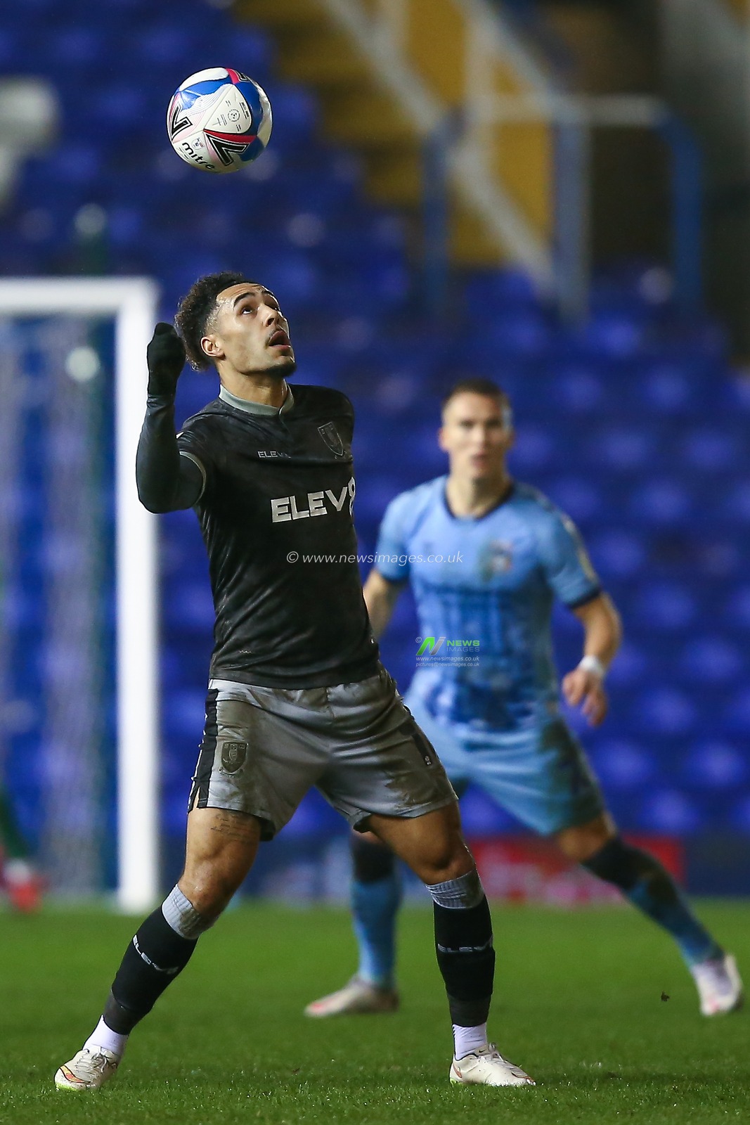 Andre Green #16 of Sheffield Wednesday keeps his eyes on the ball