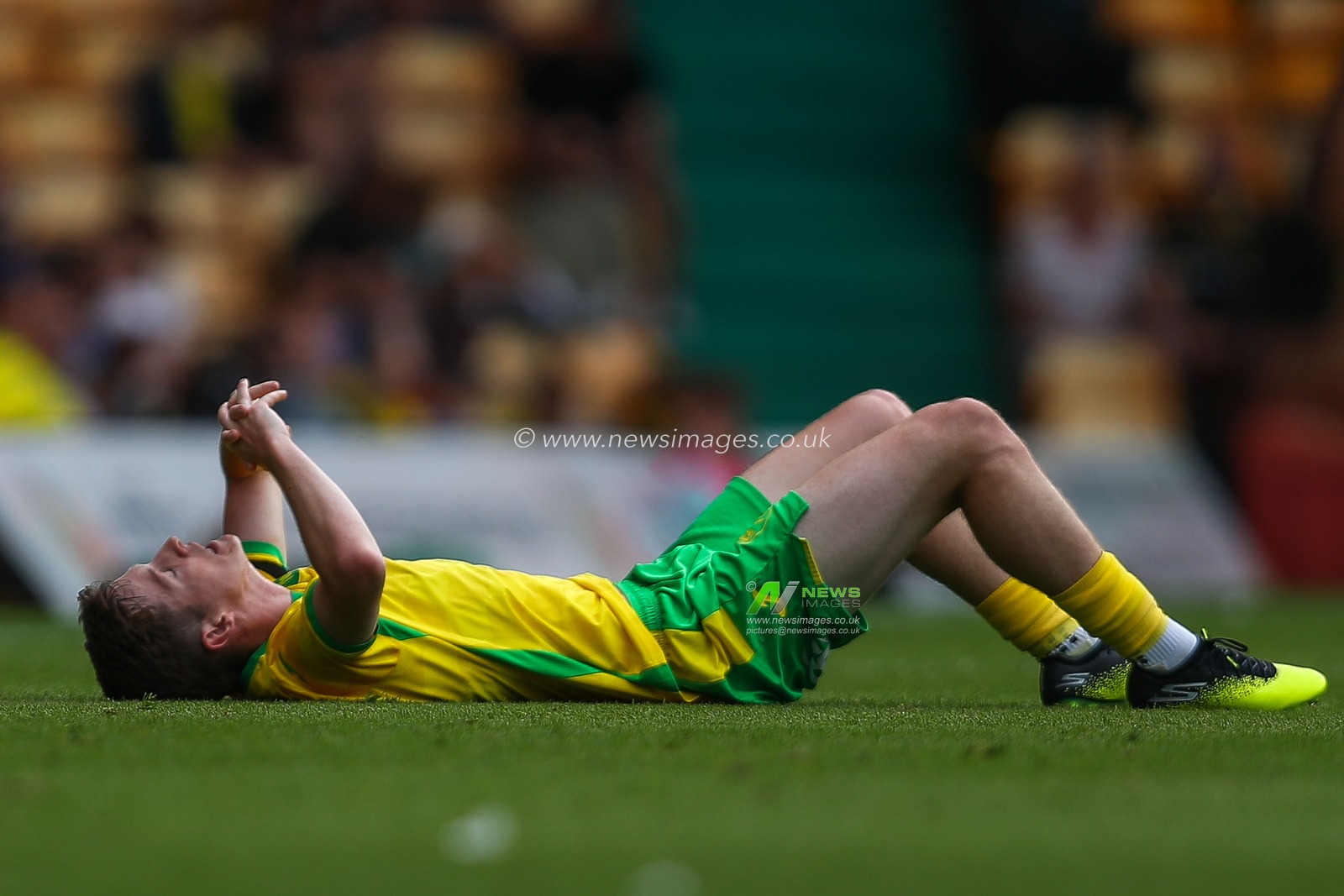 Kellen Fisher of Norwich City goes down with an injury during the Pre-season friendly match Norwich City vs St. Pauli at Carrow Road, Norwich, United Kingdom, 3rd August 2024

(Photo by Izzy Poles/News Images)