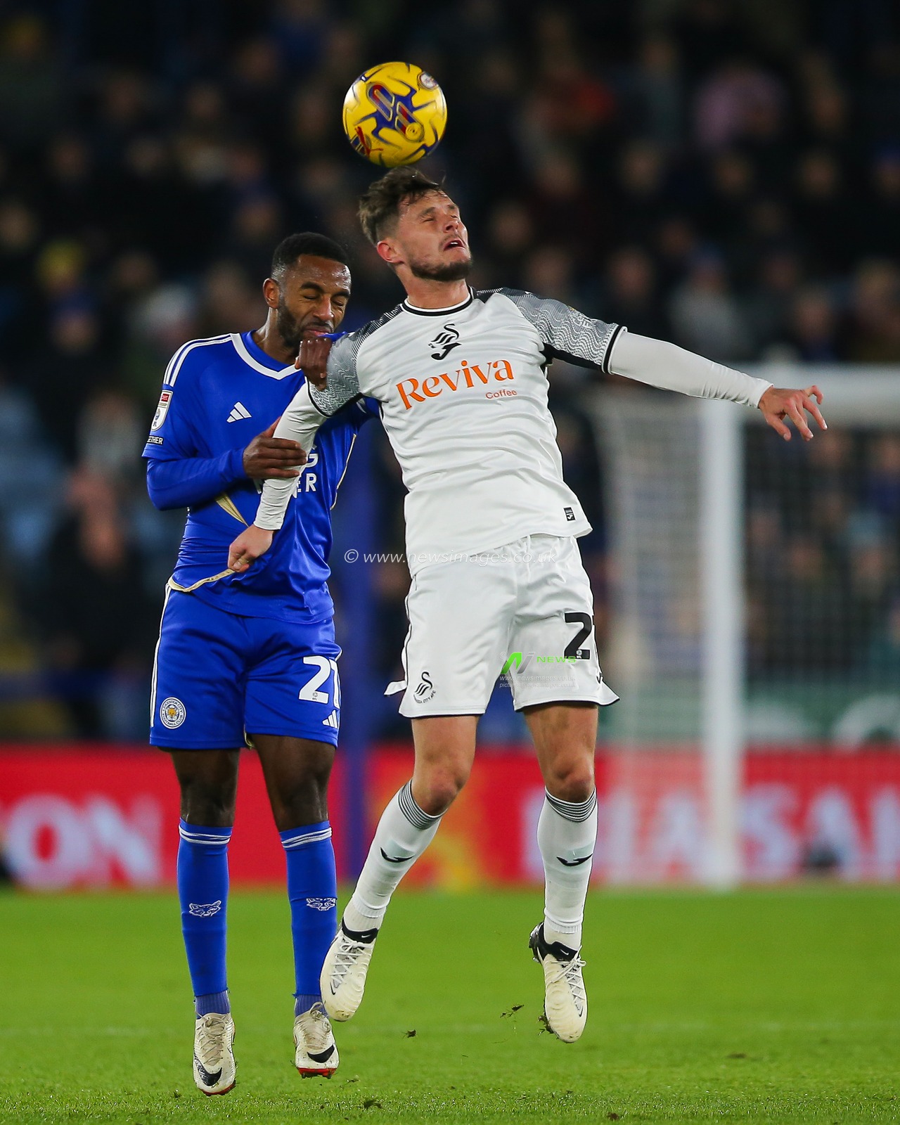 Ricardo Pereira of  Leicester City and Liam Cullen of Swansea City battle for the ball during the Sky Bet Championship match Leicester City vs Swansea City at King Power Stadium, Leicester, United Kingdom, 30th January 2024

(Photo by Gareth Evans/News Images)